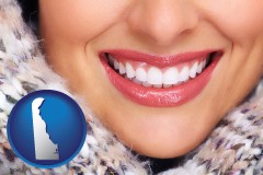 delaware map icon and beautiful white teeth forming a beautiful smile