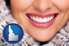 idaho map icon and beautiful white teeth forming a beautiful smile