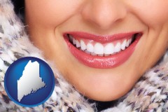 maine map icon and beautiful white teeth forming a beautiful smile