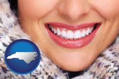 north-carolina map icon and beautiful white teeth forming a beautiful smile