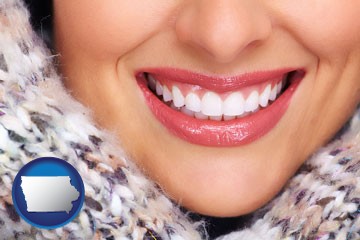 beautiful white teeth forming a beautiful smile - with Iowa icon