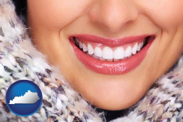 beautiful white teeth forming a beautiful smile - with Kentucky icon