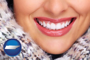 beautiful white teeth forming a beautiful smile - with Tennessee icon