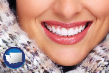 beautiful white teeth forming a beautiful smile - with Washington icon