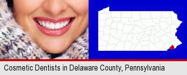 beautiful white teeth forming a beautiful smile; Delaware County highlighted in red on a map