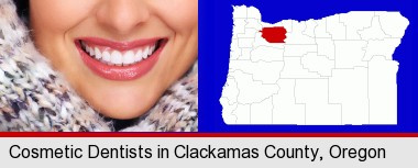 beautiful white teeth forming a beautiful smile; Clackamas County highlighted in red on a map