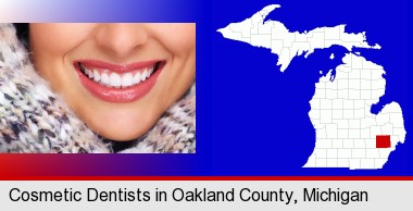 beautiful white teeth forming a beautiful smile; Oakland County highlighted in red on a map